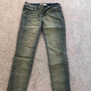 Green free people skinny jeans in 24